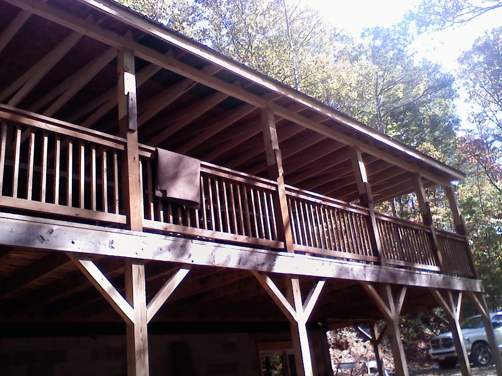 Timber framing under a new elevated porch and deck — Roof Leak Repair in Indio by Roofing Brothers